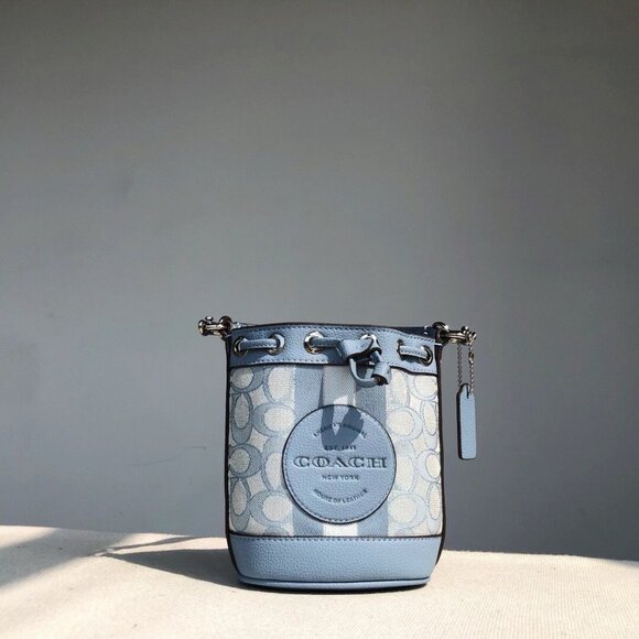 Coach Handbags - Coach Mini Dempsey Demin Bucket Bag Blue Signature Jacquard Top Handle Leather